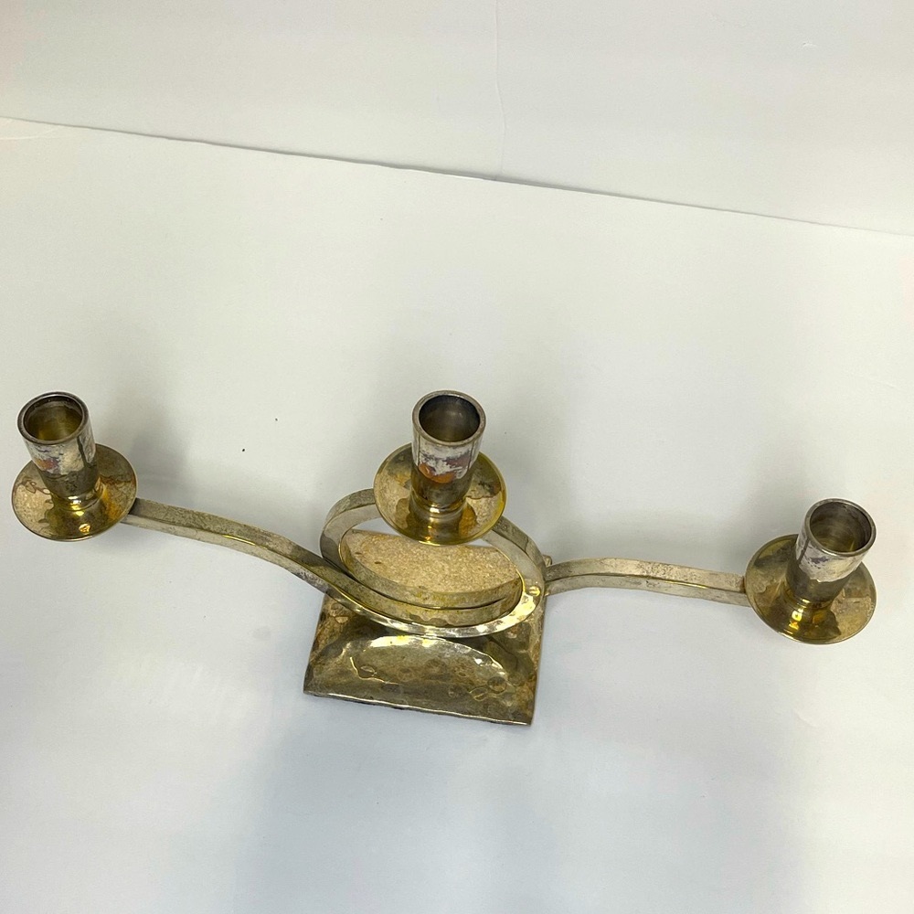 Silver hammered Reformation candleholder. Modernist style. Minimalist.